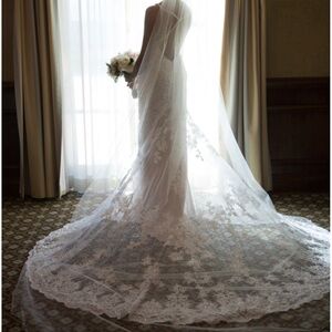 Wedding dress with train. Veil also available if interested. Price negotiable.